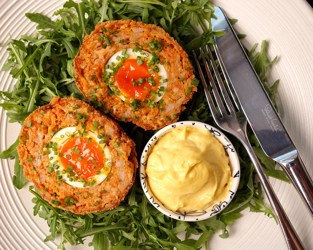 Chorizo scotch eggs with garlic aioli