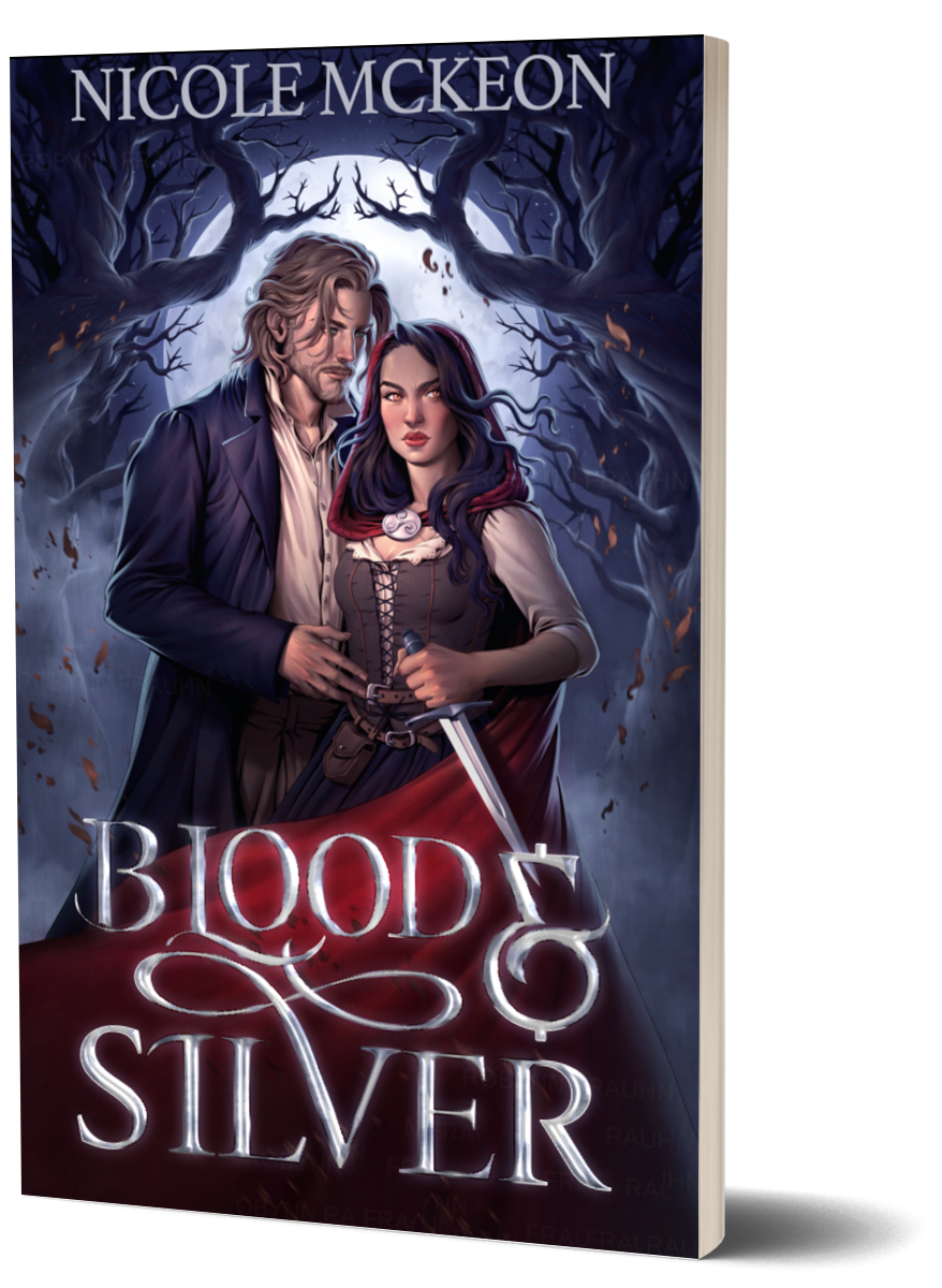 Fantasy romance book cover with a blonde man and dark-haired woman in a red cloak standing in the dark forest beneath a full moon