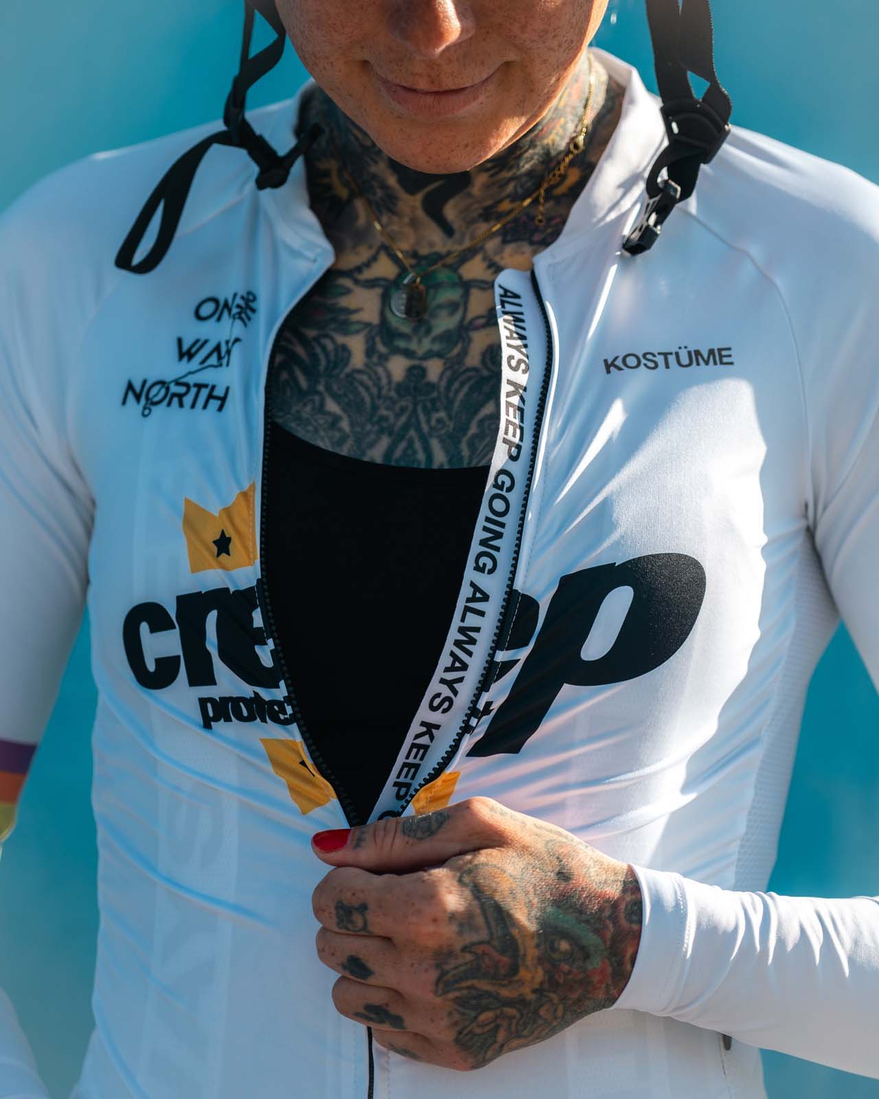 Sarah Ruggins showcasing her final Kostume jersey for One Way North