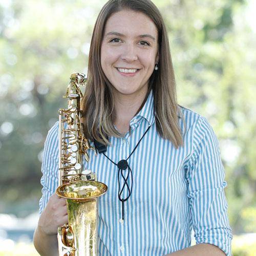 Saxophonist Jessica Voight-Page holding a saxophone