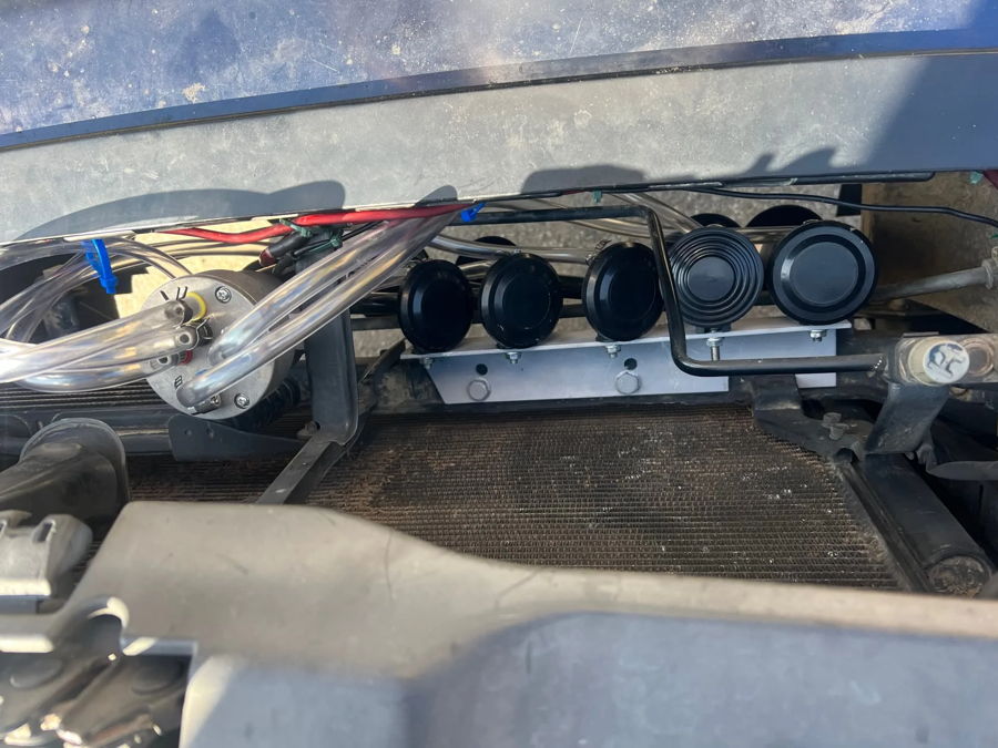 Five black horn bells mounted radiator bracket air manifold clear tubing Trevor's Toyota 4 Runner Dixie musical horn engine bay gallery photo 3