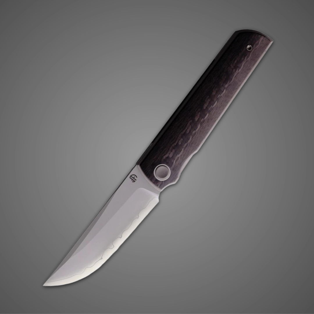 Folding knife with a silver blade and dark handle on a gray background.