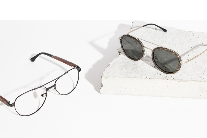 flat lay image of Kraywoods eyeglasses and sunglasses frames suited for different face shapes, on a white background