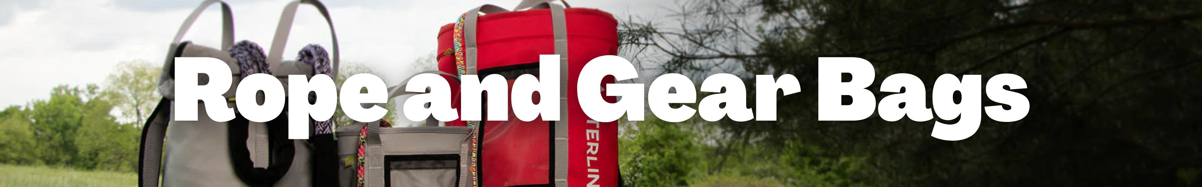 Rope and gear bags displayed outdoors.