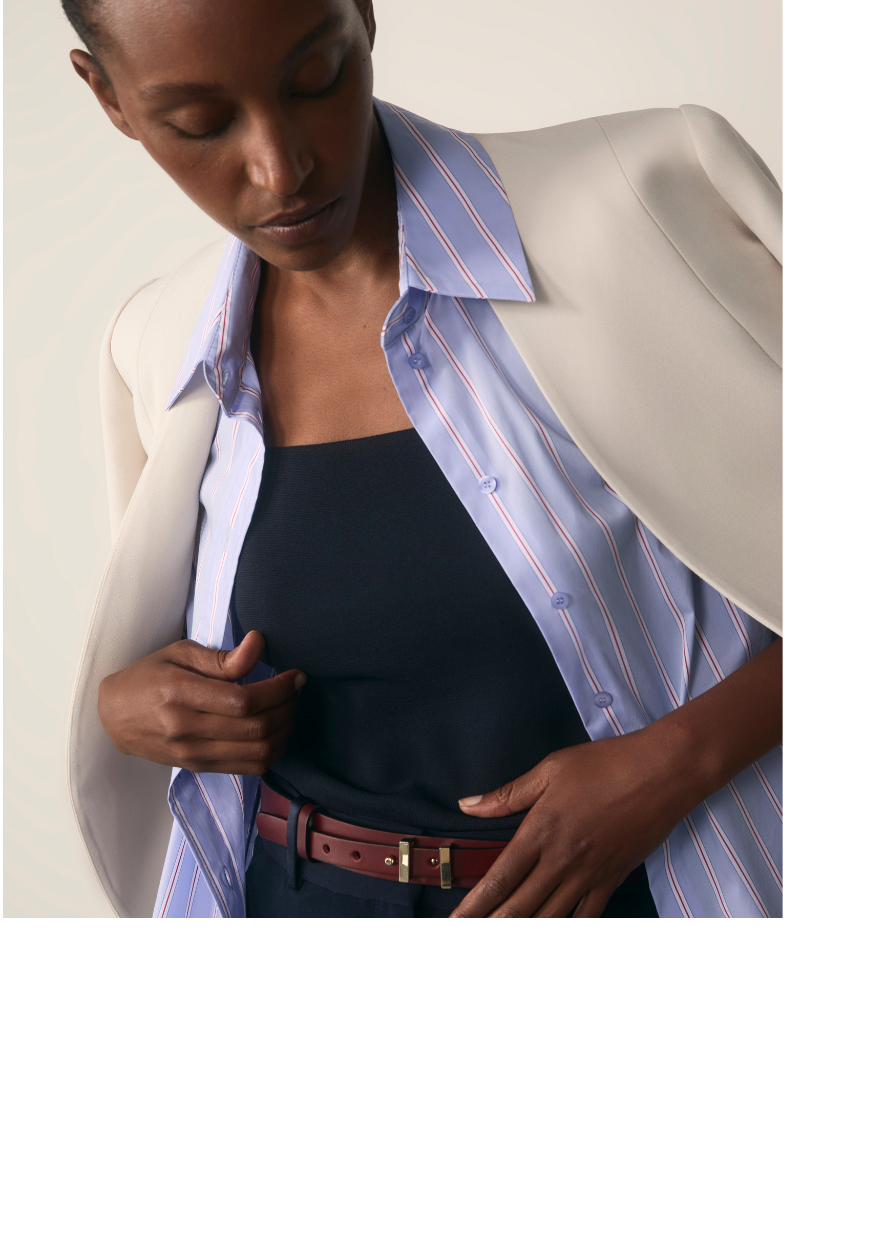 Model wearing blue stripe Claudia shirt with stone Selsey jacket